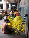 Piles of marigolds, City Market, Bangalore, Karnataka. Taken with a Canon PowerShot A630. August 2008